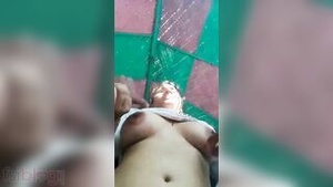 Beautiful wife from India strips and twittingly stimulates her nipples and clitoris in an adult film.