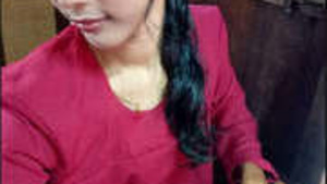 A skinny teenage girl pleasuring herself with a cucumber and a carrot