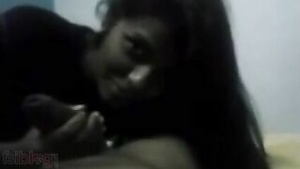 Blue film with XXX content featuring an college beauty giving a blow job