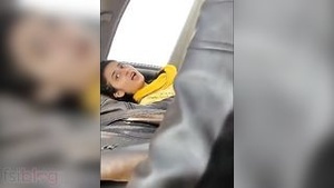 A Indian college girl gives blow job to her boyfriend in the car