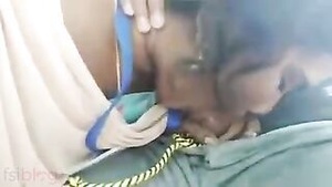 Outdoor scene of a young Indian woman pleasuring herself with a sex toy.