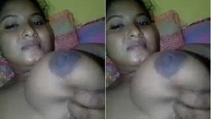 Beautiful Indian woman displaying her charms