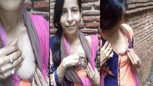 Boobs of a rustic village girl exposed outdoors for her boyfriend’s pleasure.