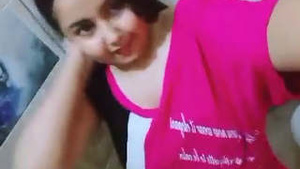 A horny girl performs in the bathroom