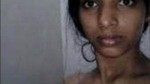 Beautiful woman with perfect body shows her charms in the bathroom.