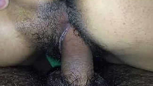 The hairy housewife gets her wet pussy pounded by her husband while she is being filmed.