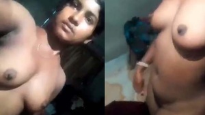 Bengali housewife Budi reveals her red pussy hole in this video.