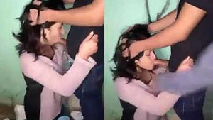 A woman giving oral sex to her boyfriend while their friend watches.