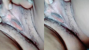 This is a video of a Indian girl exposing her breasts and vagina.