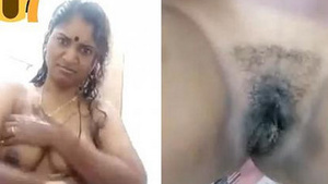 A beautiful bhabi is taking a bath in the tub and exposing her private part.