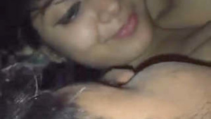 An Assami girl is dong it doggy style with a stud.