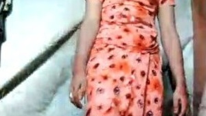 A beautiful Odia girl wearing a dress then she opens it.