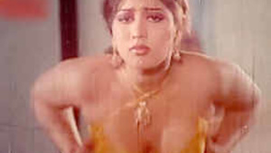 Beautiful Indian woman Shopna showing off her great big boobies through a transparent dress