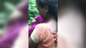 Beautiful Desi woman scandalous MMS video outdoors in the woods.