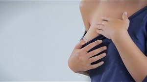 Beautiful woman enjoys solo pleasure