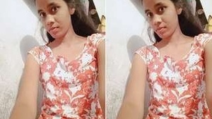 Pretty Indian girl strips for her lover and gets some money
