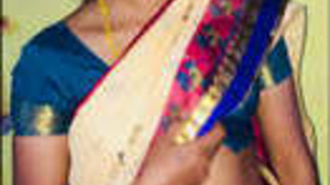 Delighting in the sight of a famous woman from Tamil Nadu who has removed her clothing.