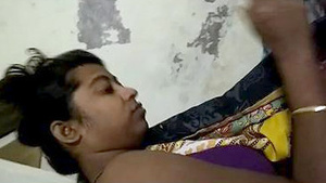 Young Indian woman performing oral sex on a man