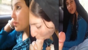 Pretty woman enjoys giving oral sex to her man in the car