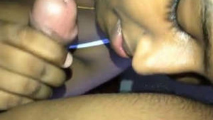 Pretty Tamil babe giving blow job