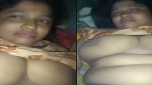 Married woman from Khulna engages in devar-cdling with husband on camera.