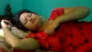 A horny bhabi satisfied by her customer in an Indian adult video