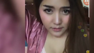 Asian girl’s beautiful breasts exposed in video chat