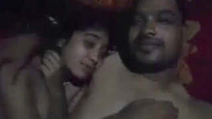 Beautiful woman of Indian descent has sex at night.